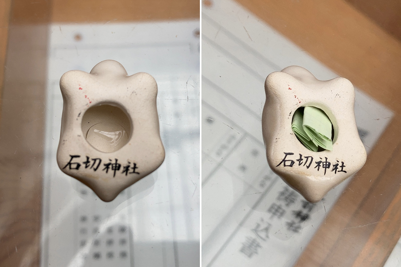 祈り亀の裏に心願ごとを書いた紙を詰める